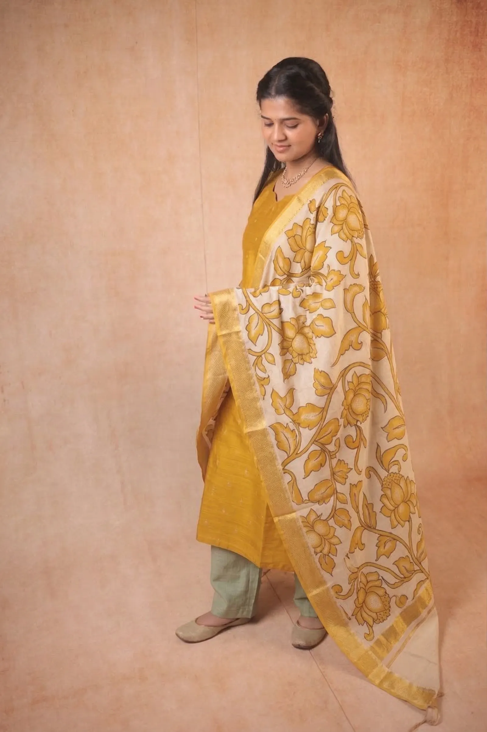 Yellow kurta with kalamkari shawl