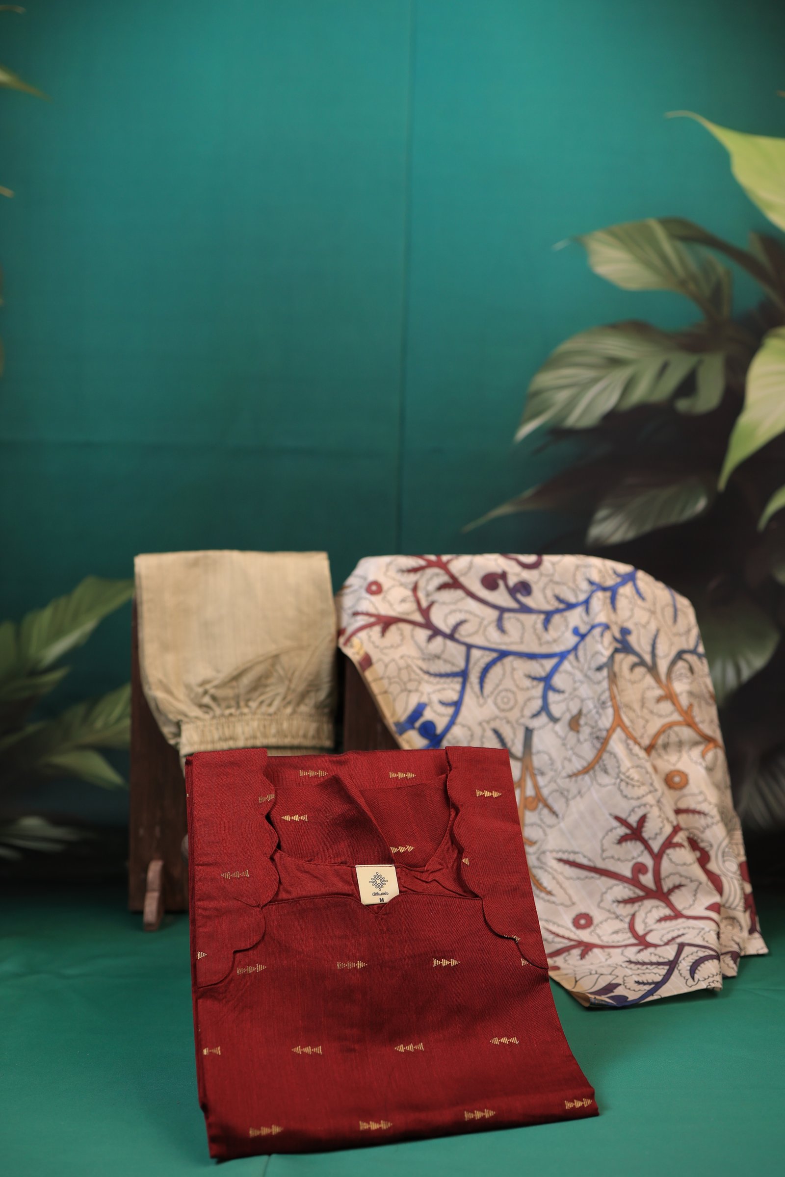 Red kurta with kalamkari shawl